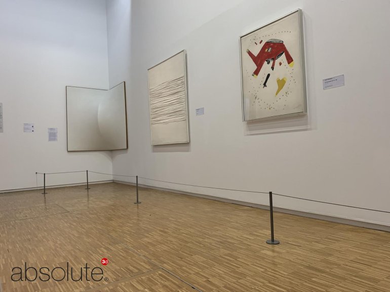 Three wall-mounted artworks in Centre Pompidou, protected by Absolute Surface Mounted Barriers.